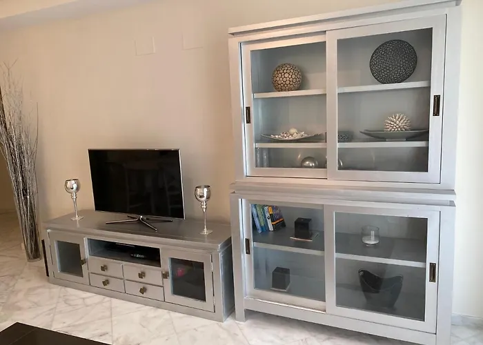 Elegant 2-Bedroom Apartment In Benidorm With Private Pool And Scenic Garden Views